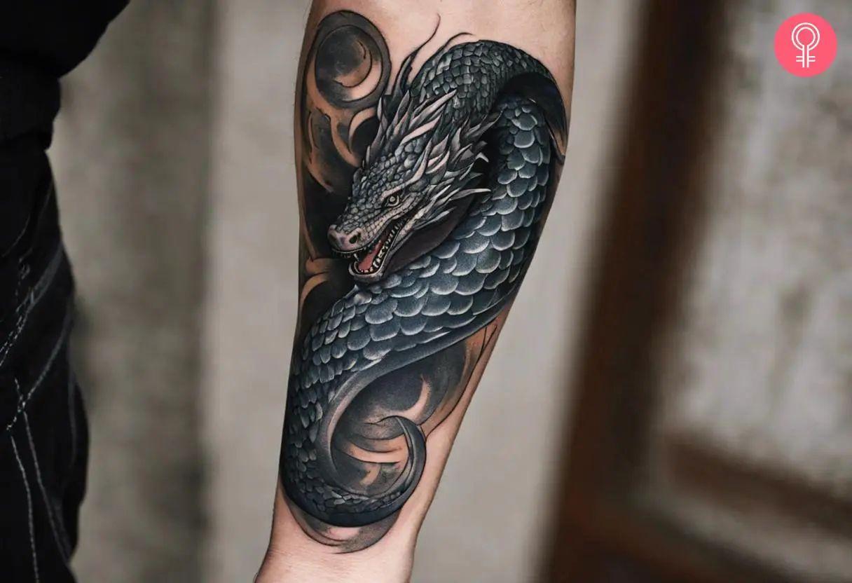 Jormungandr tattoo on the forearm