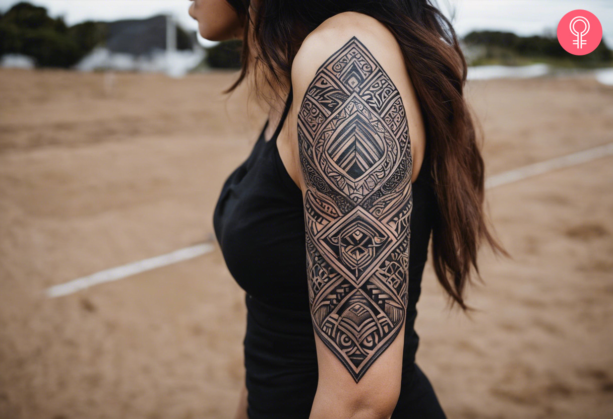 Leaf maori tattoo on the upper arm of a woman