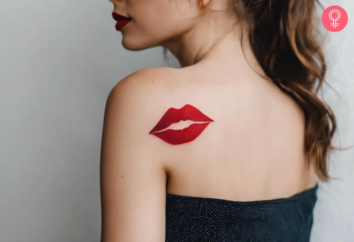 Woman with a lipstick kiss tattoo