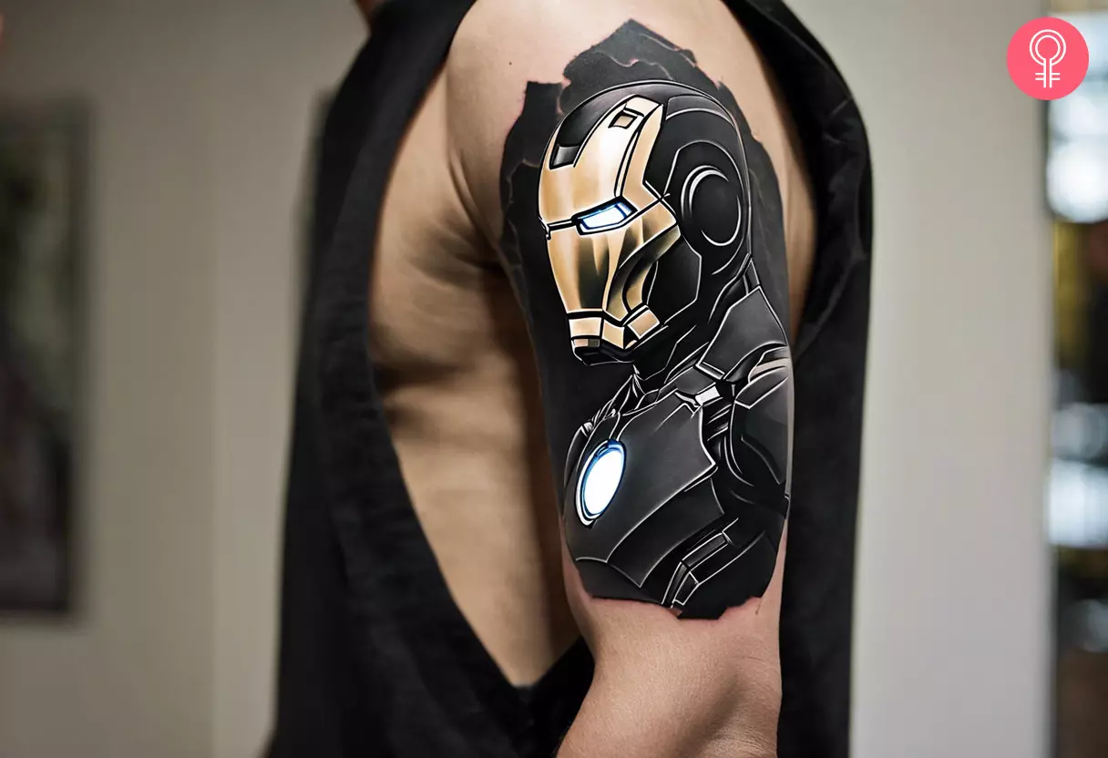 Man with a black Iron Man tattoo on his outer arm
