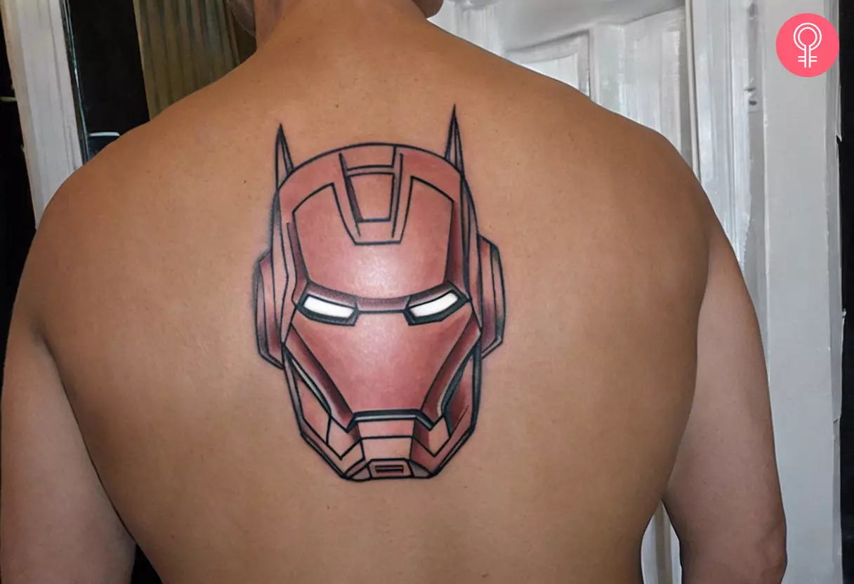 Man with an Iron Man mask tattoo on his upper back