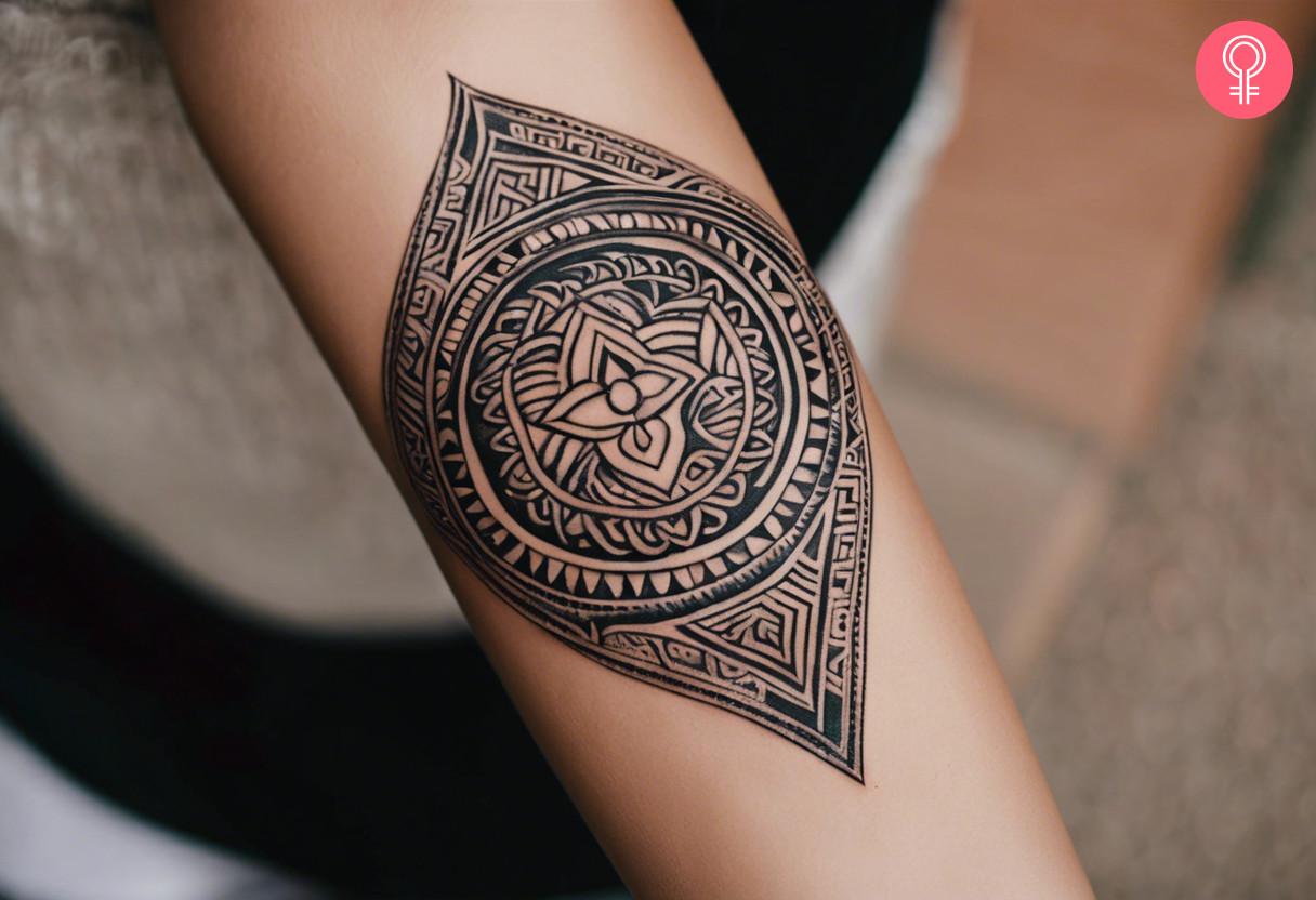 Maori tribal tattoo on the forearm of a woman