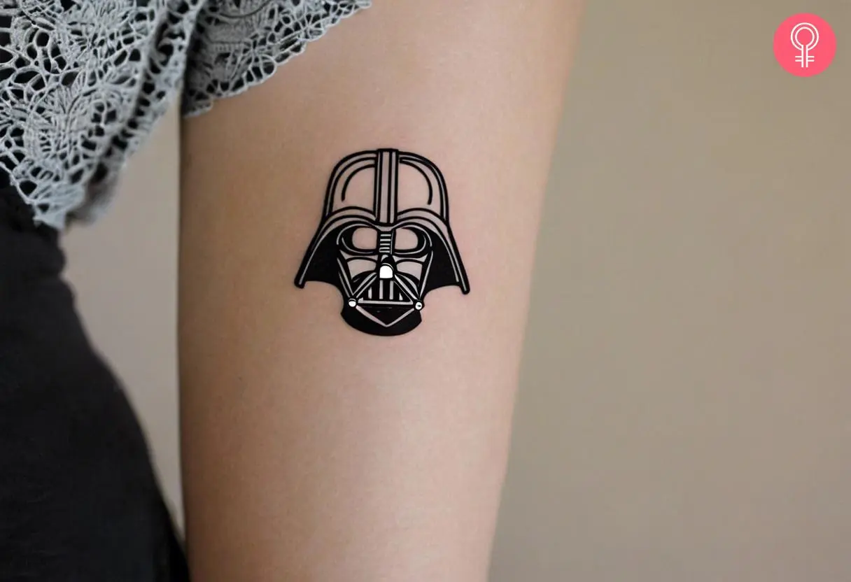 Minimalist darth vader tattoo on the forearm