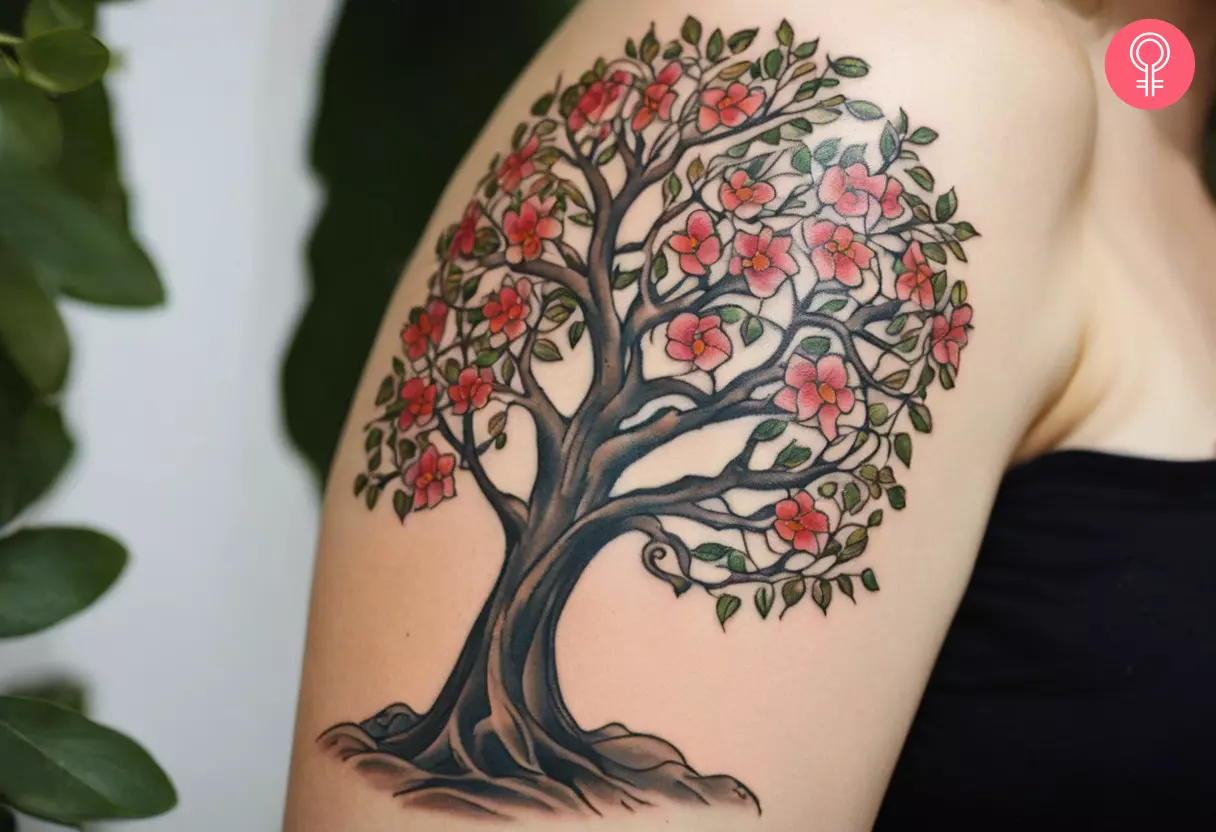 Woman with a Mother Nature tree tattoo on the arm