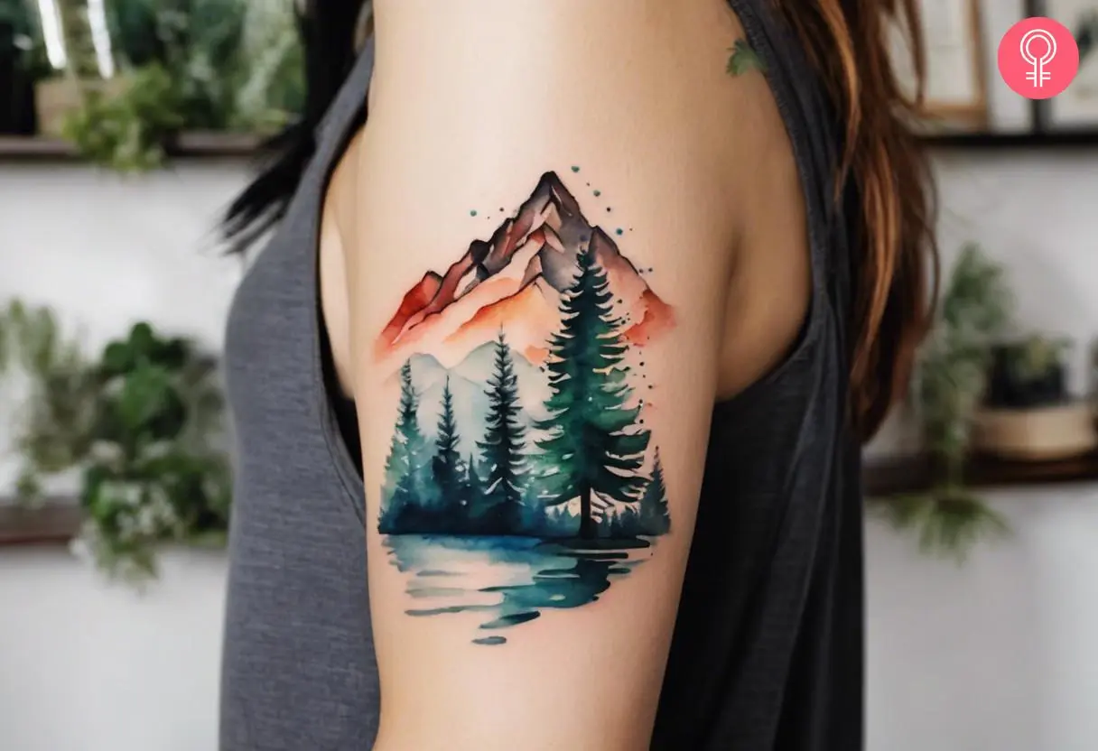 A woman with a mountain tattoo on her upper arm