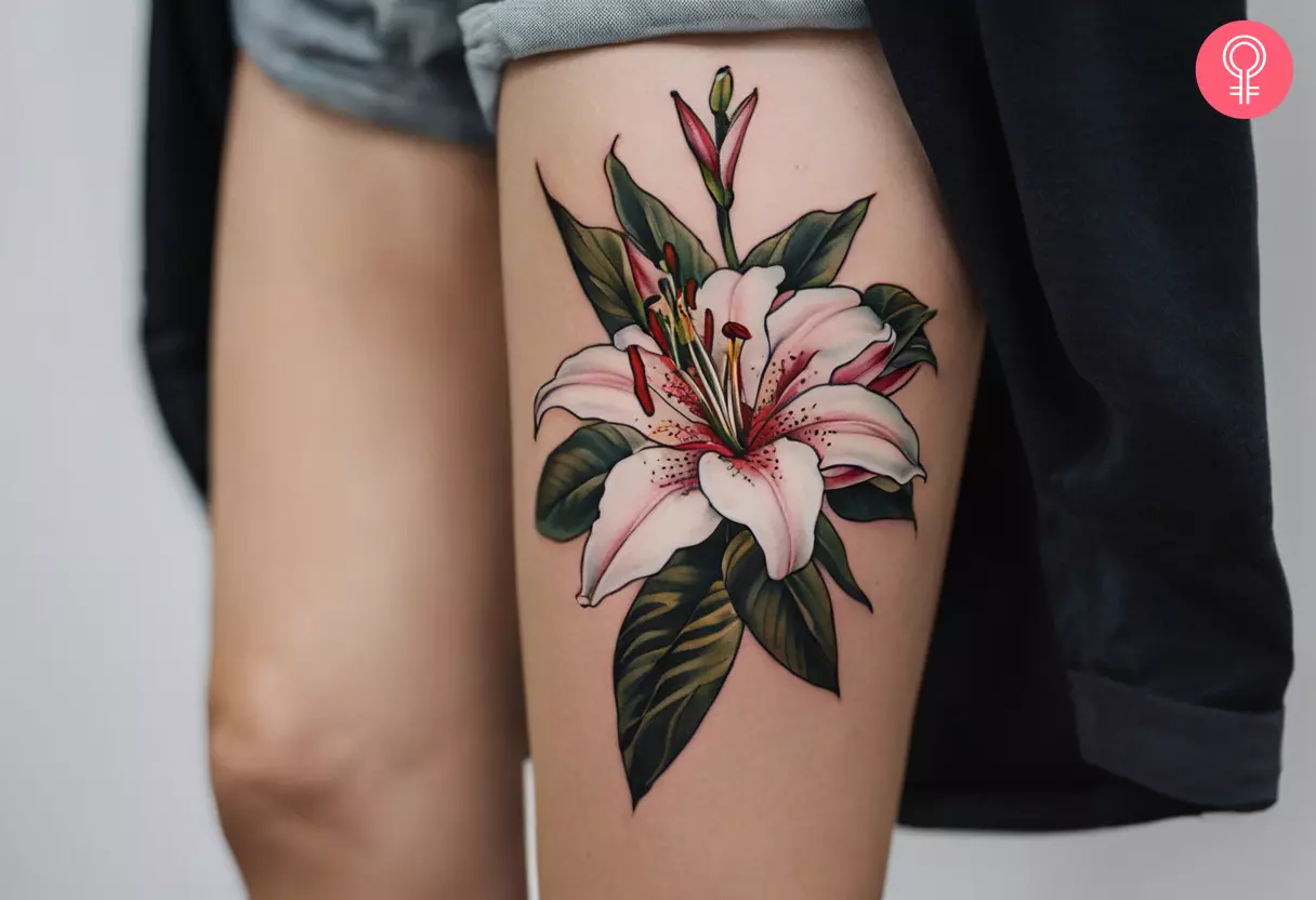An oriental lily tattoo on the thigh