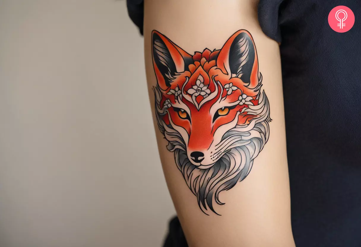 An oriental-themed tattoo on the upper arm