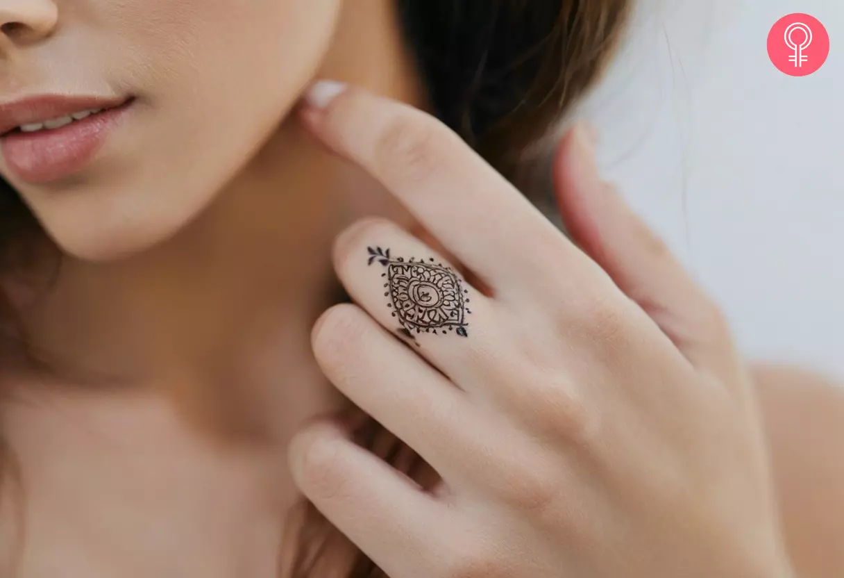 Ornamental tattoo on the finger