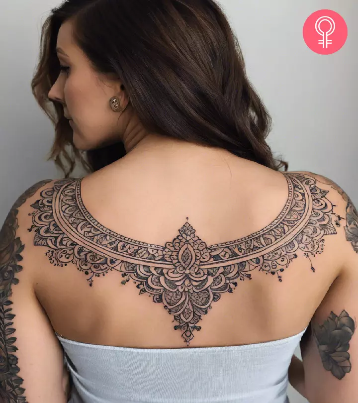 Ornamental tattoo on the upper back