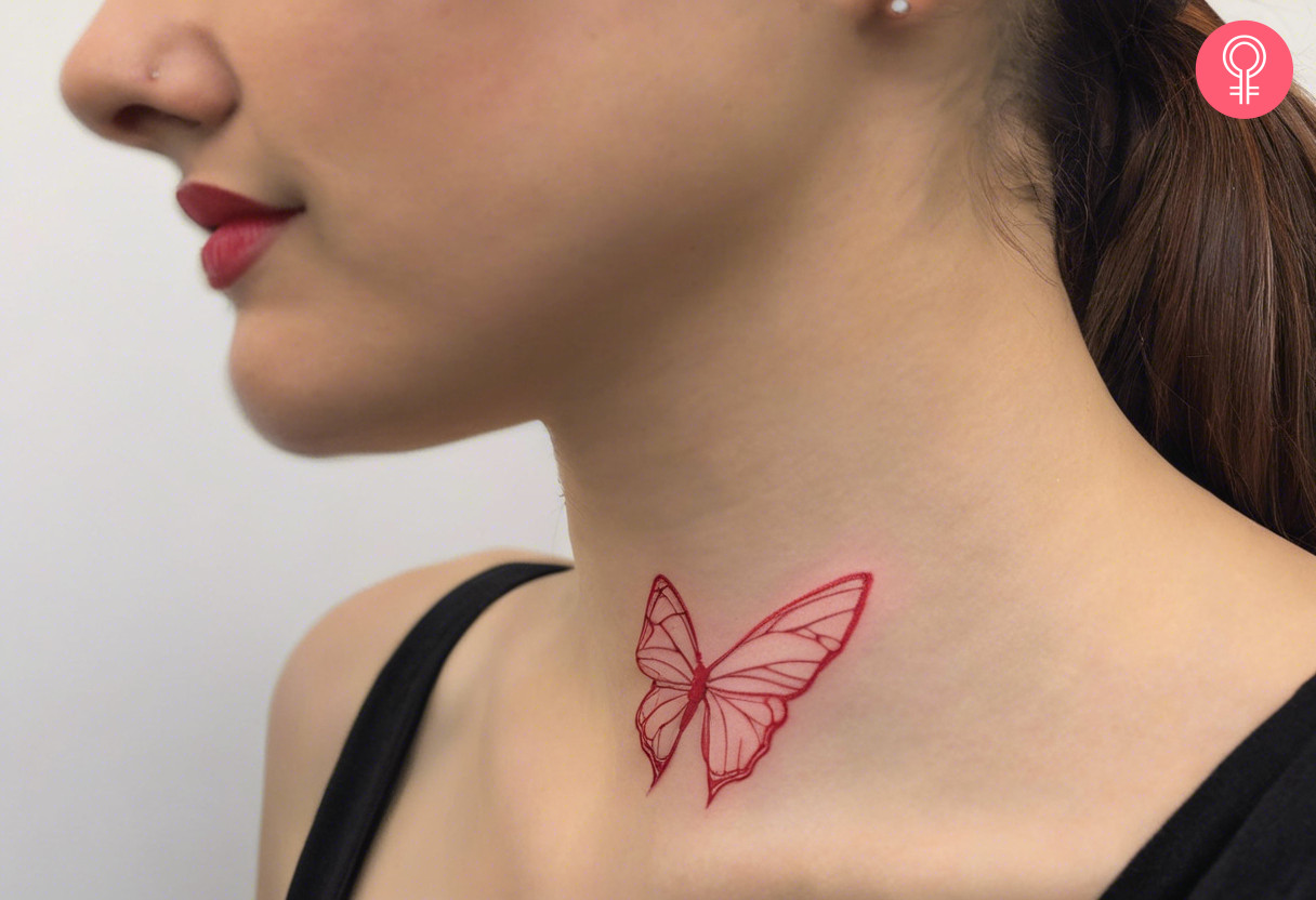 Red butterfly tattoo on a woman’s neck