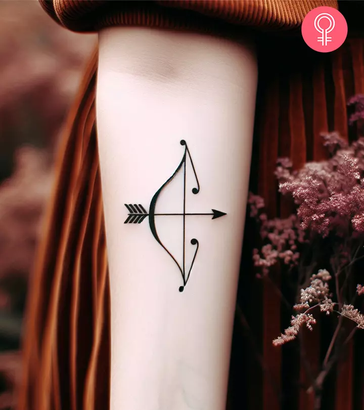 Sagittarius bow and arrow tattoo on a woman’s forearm
