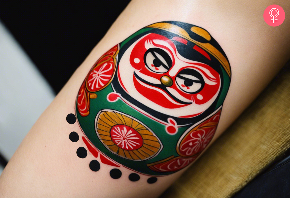 Simple Daruma doll tattoo on the arm