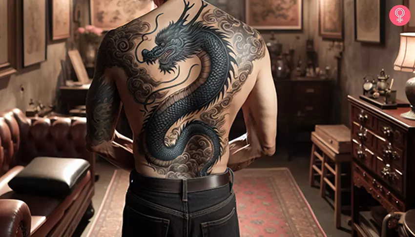 Slate blue Korean dragon tattoo on the back of a man
