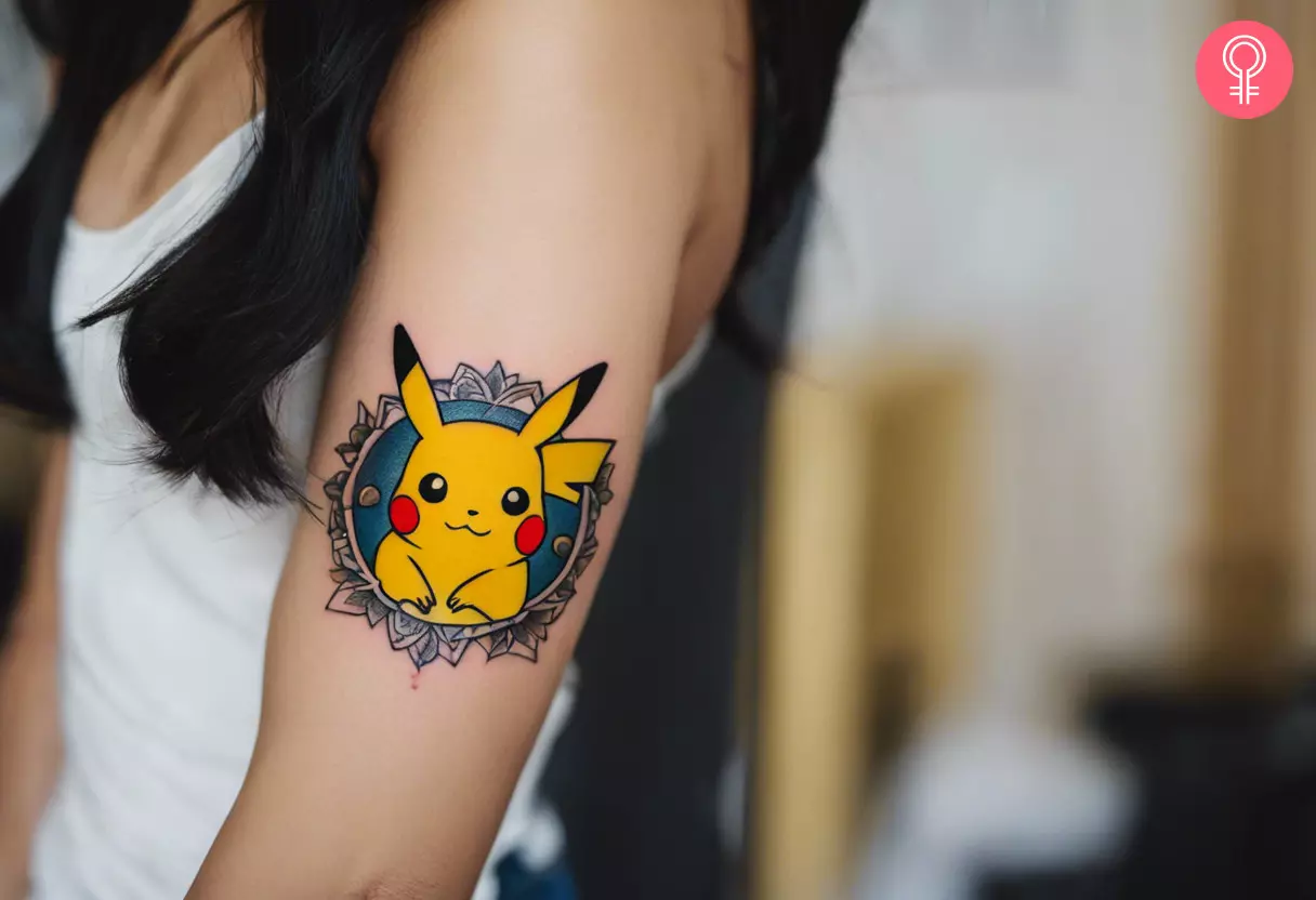 A woman with a vibrant Pikachu tattoo on her upper arm 