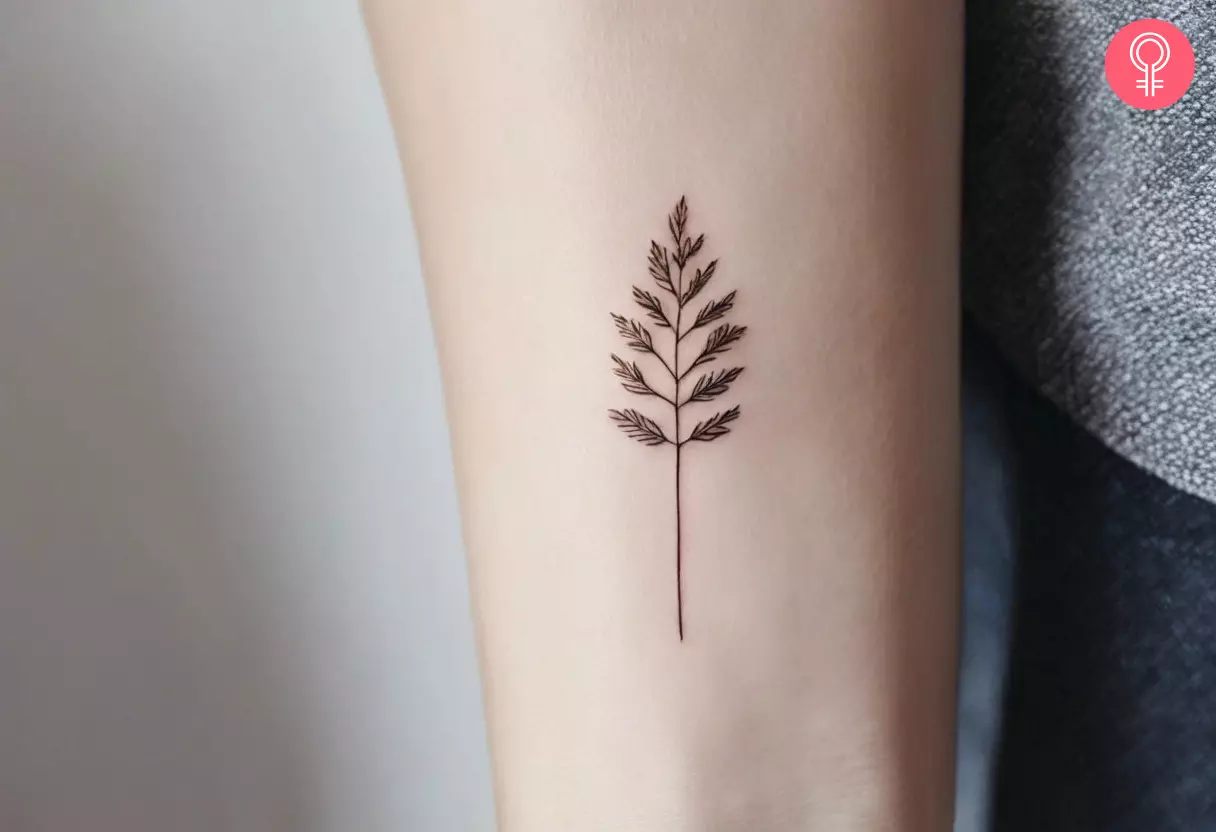 Small leaf tattoo on the arm