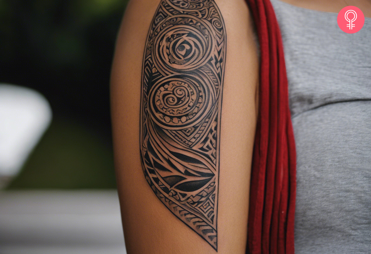 Spiral maori traditional tattoo on the upper arm