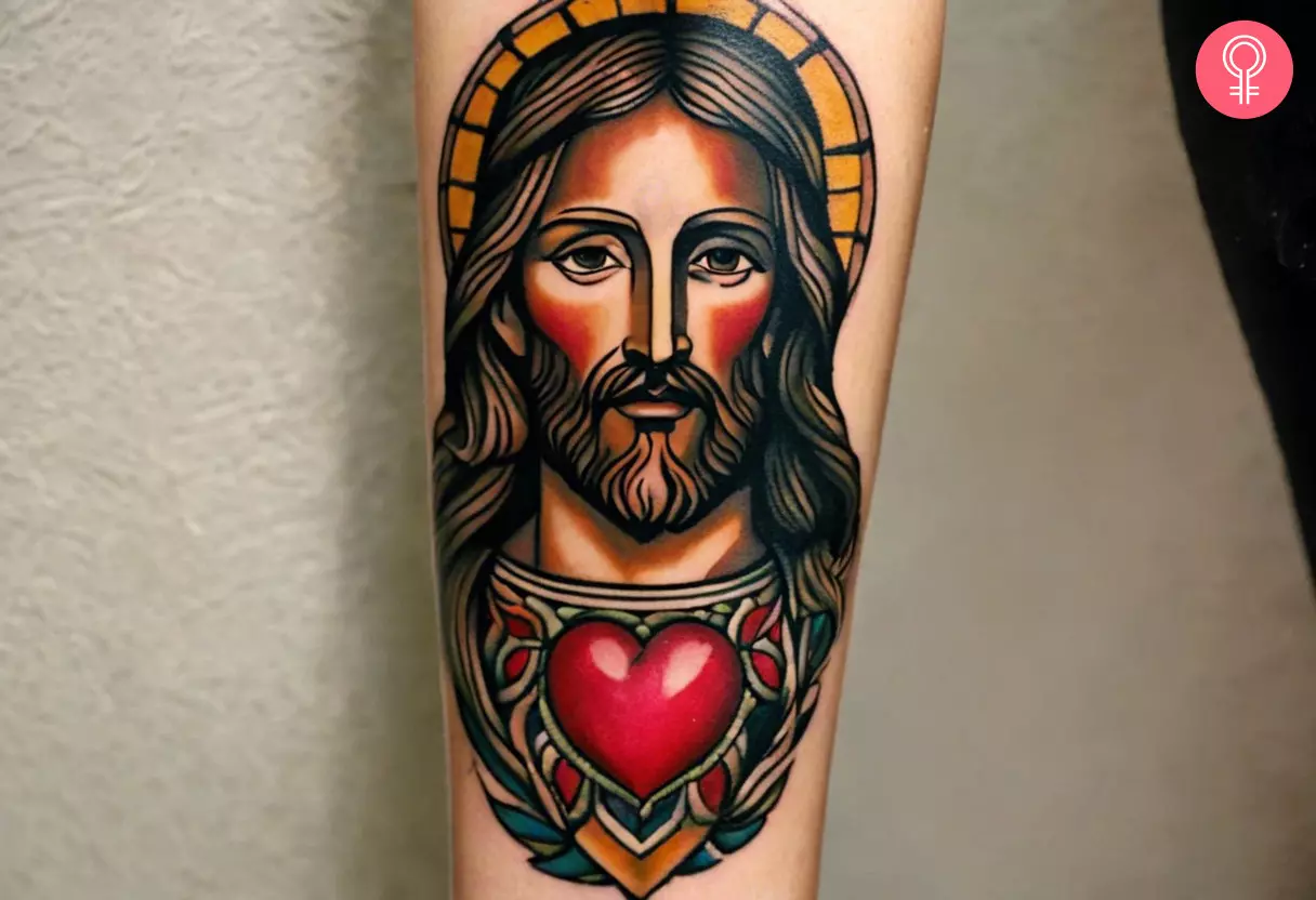 Tattoo of Jesus with a heart on the forearm