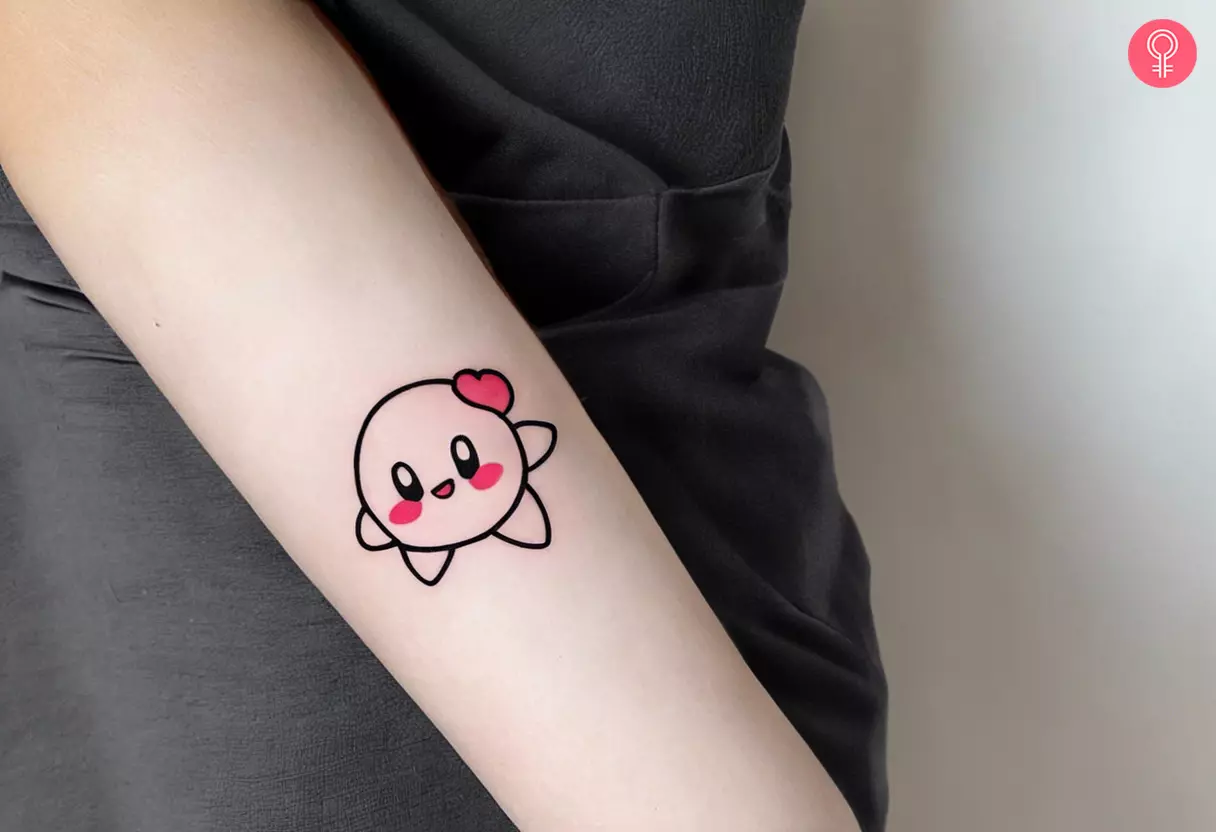 Tattoo of kirby outline on the arm