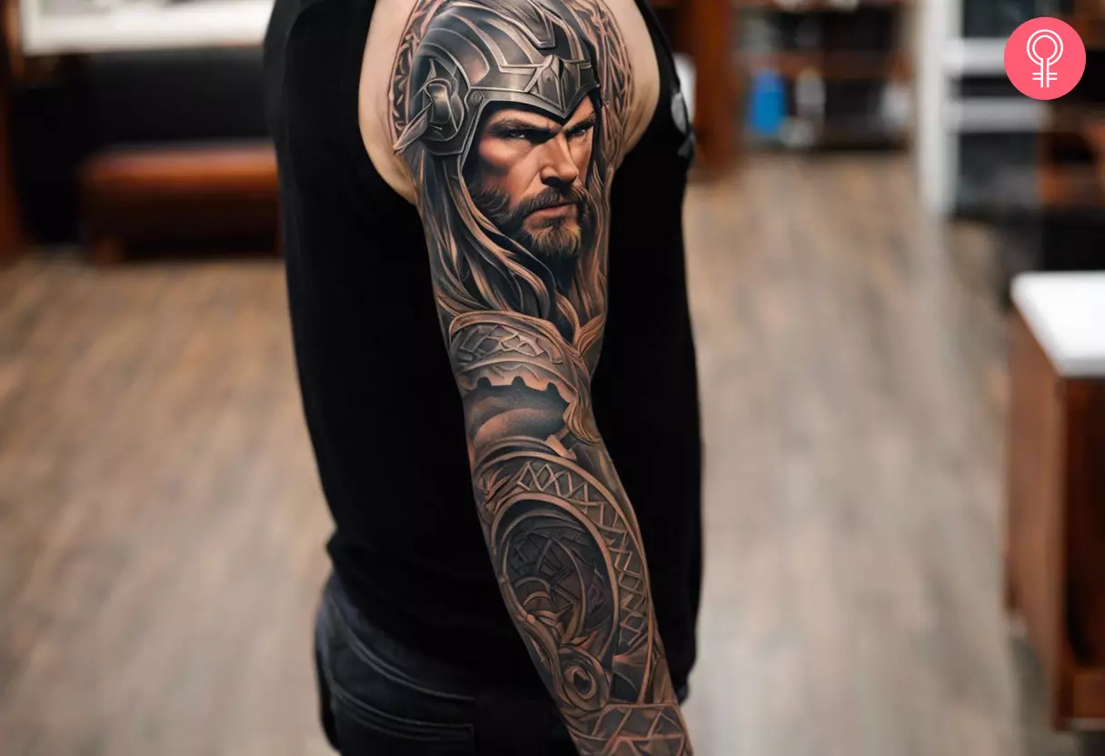 A man wearing a Thor sleeve tattoo