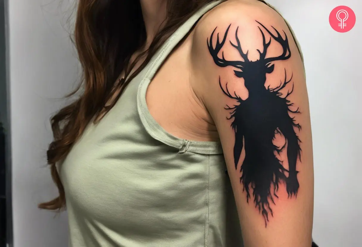 A traditional wendigo tattoo on the upper arm