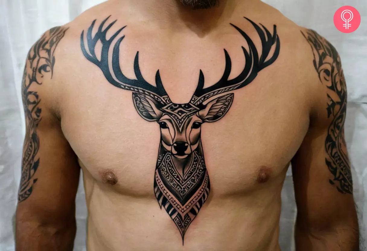 Tribal deer tattoo on a man’s chest