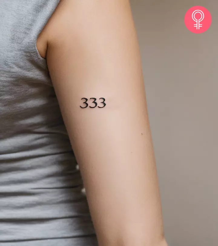 Woman with a 333 tattoo on her arm