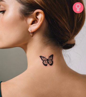 A beautiful blue butterfly tattoo on a woman’s arm