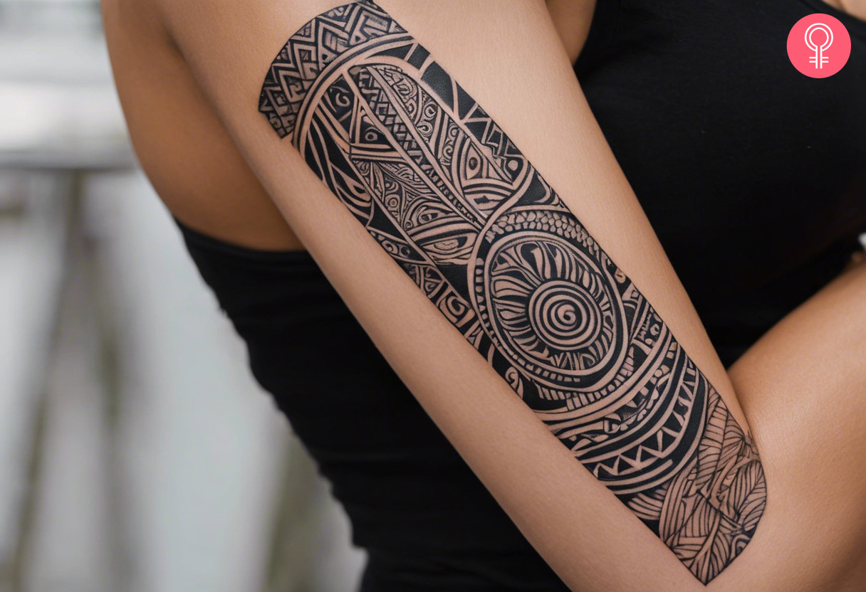 Upper arm maori tattoo design for women