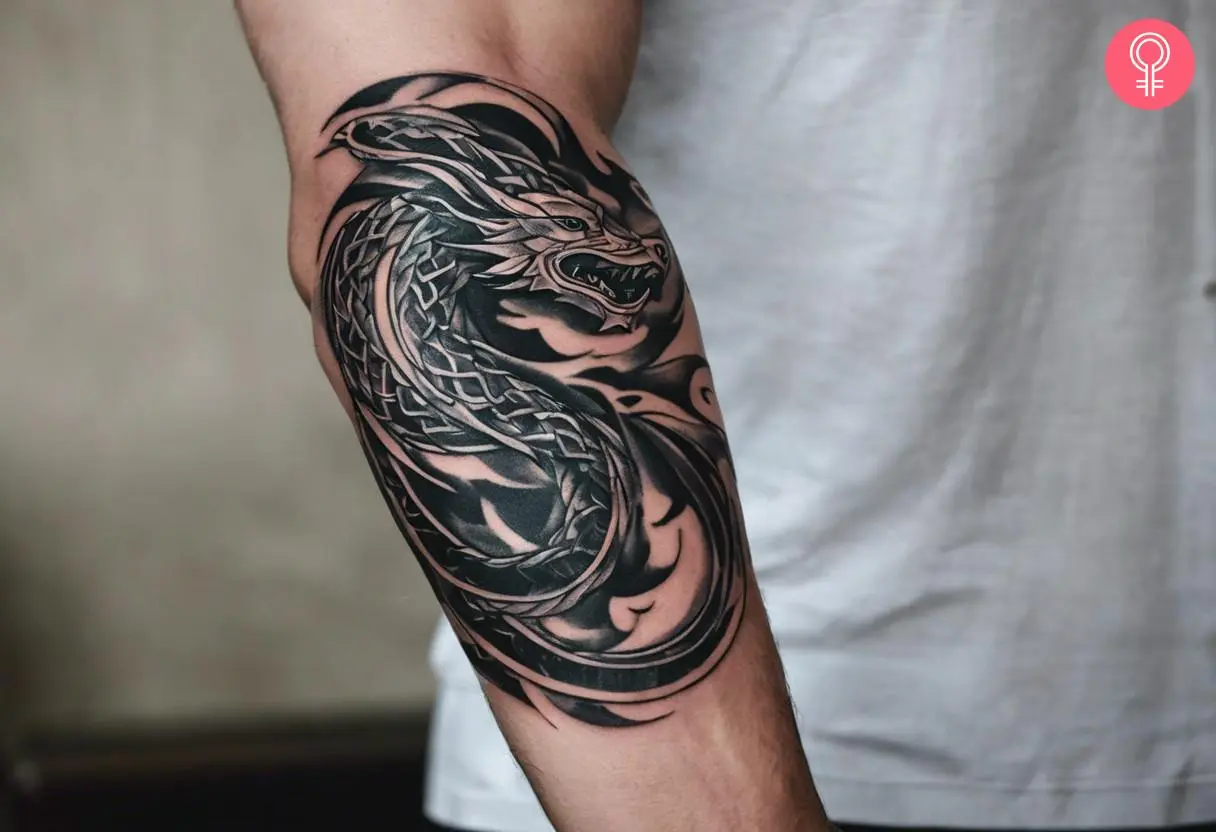 Viking Jormungandr tattoo on the forearm