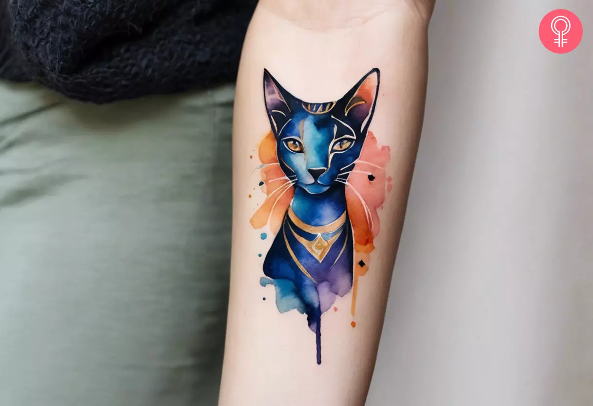 Watercolor bastet tattoo on the lower arm