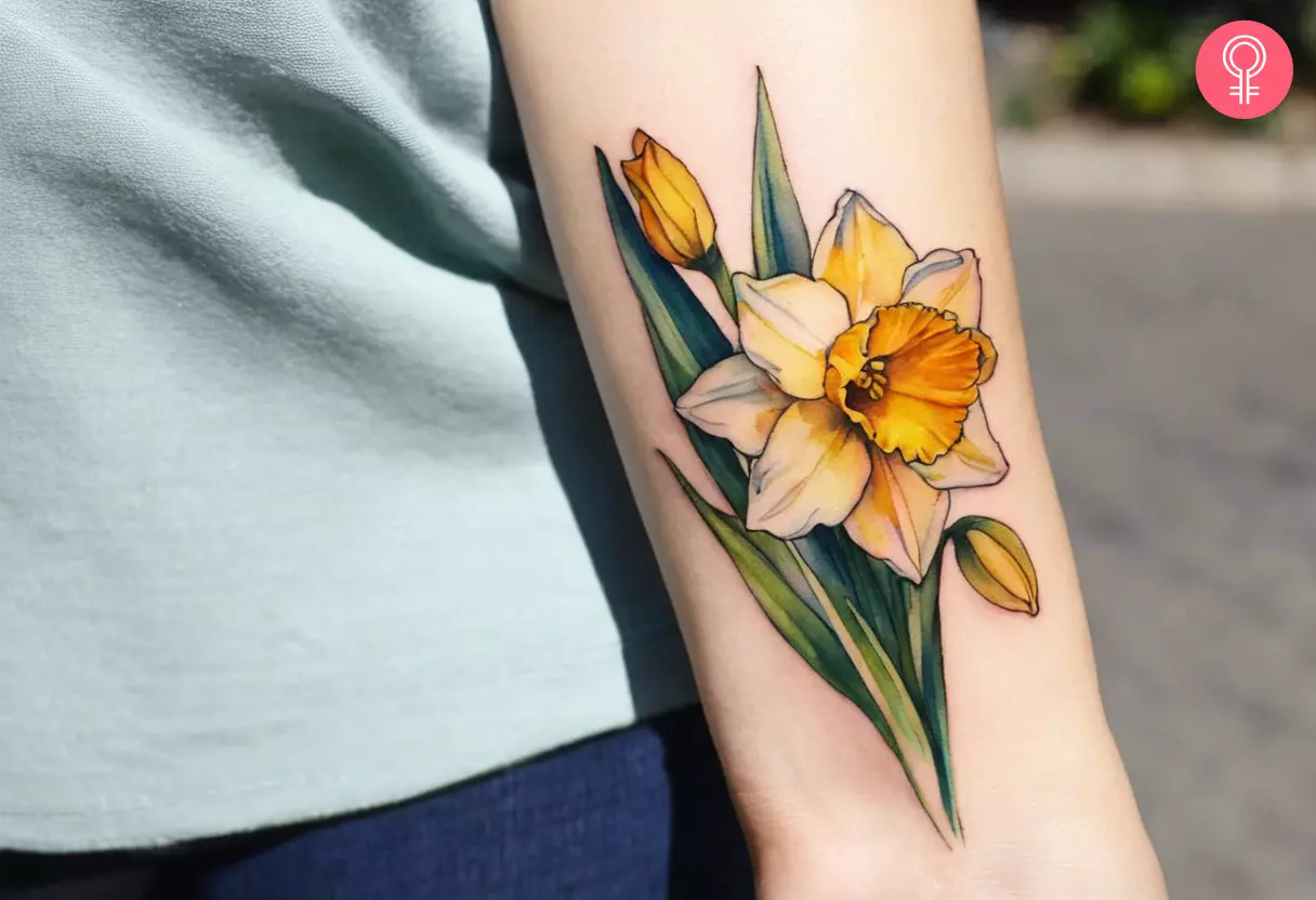 Woman flaunting a narcissus flower tattoo on her forearm