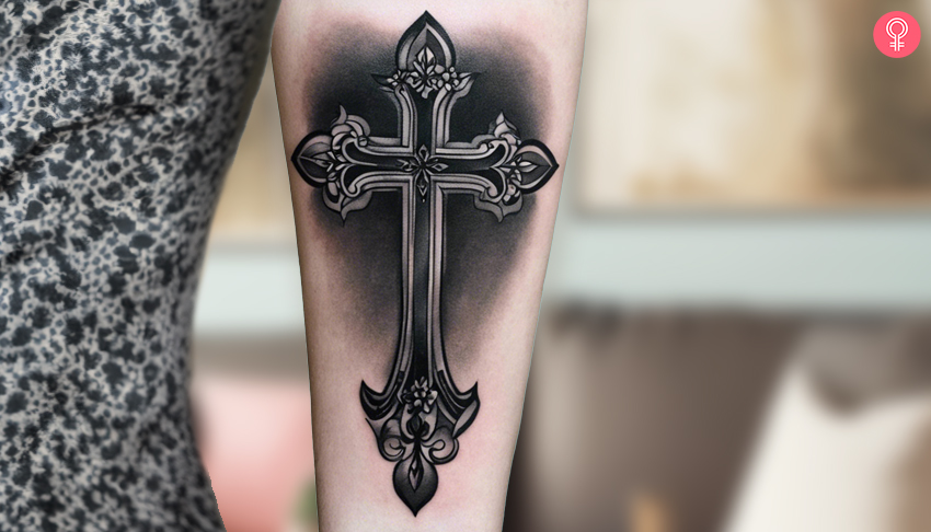 Woman with a Gothic cross tattoo