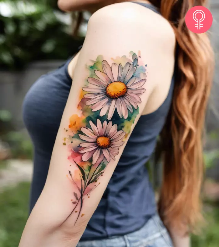 Woman with a daisy tattoo