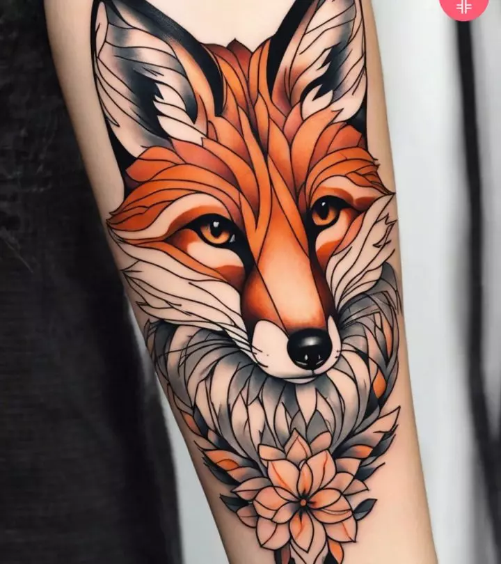 Woman with a fox tattoo on the forearm