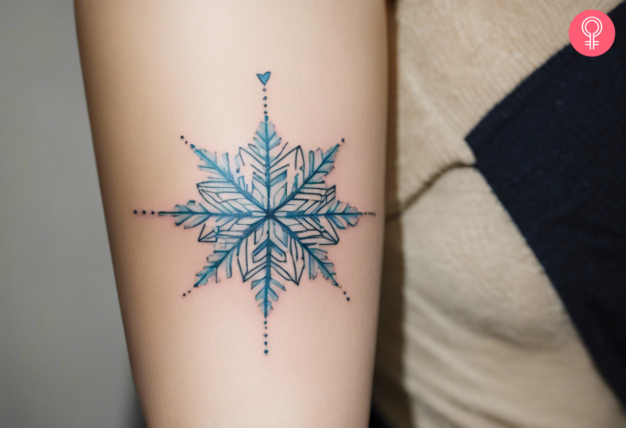 Woman with a ice crystal snowflake tattoo