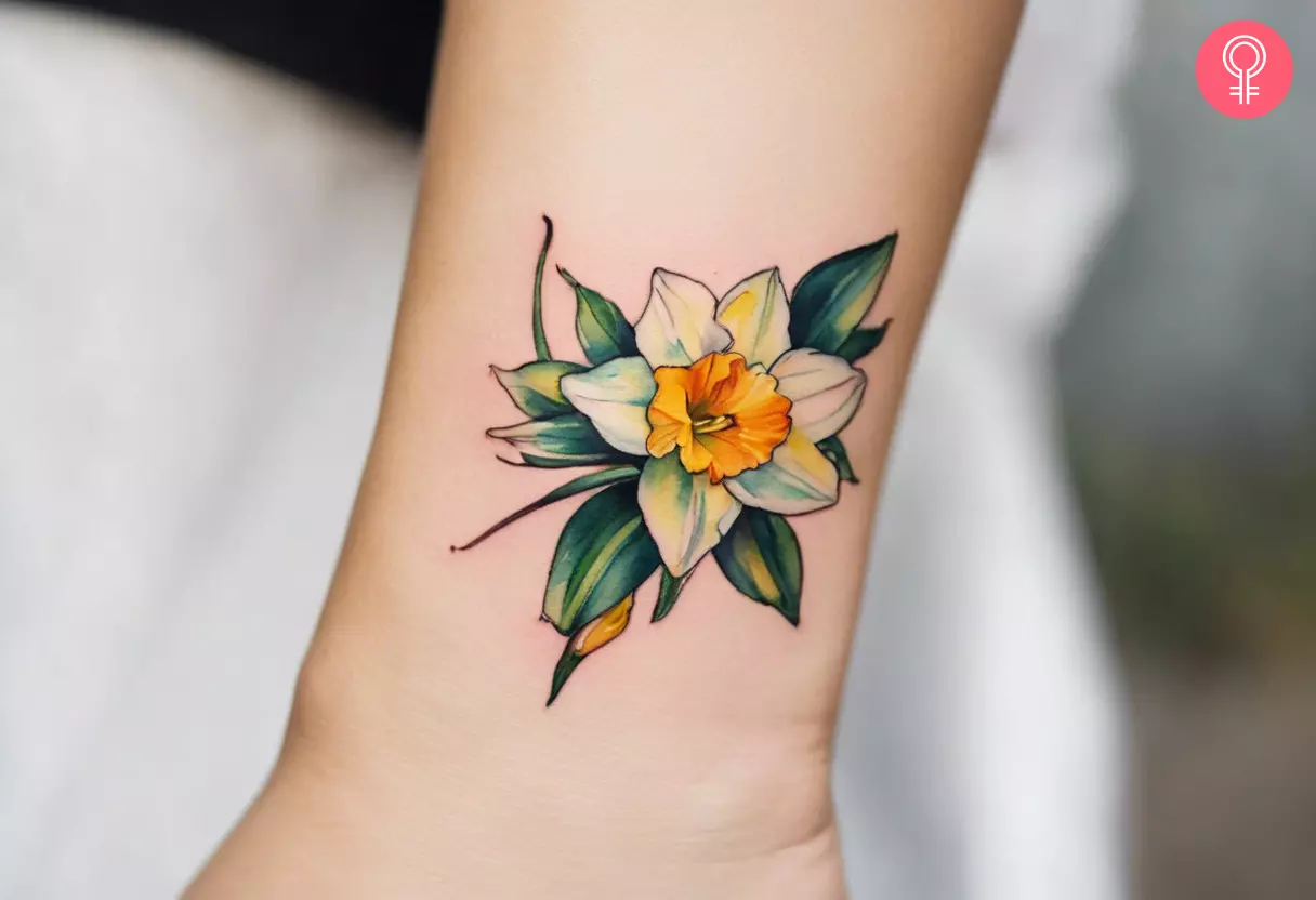 Woman with a narcissus tattoo on the wrist
