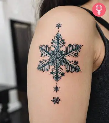 A crystal tattoo on the forearm