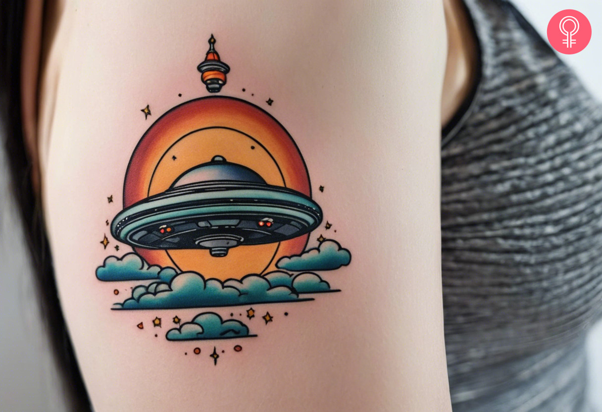 Woman with cartoon UFO tattoo on her outer arm