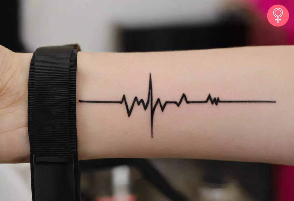 Lifeline tattoo on the wrist of a woman