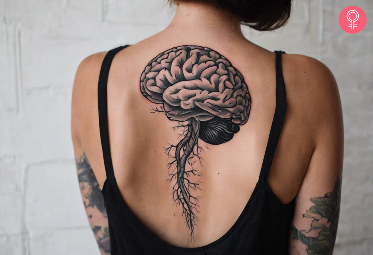 woman with traditional brain tattoo on her back