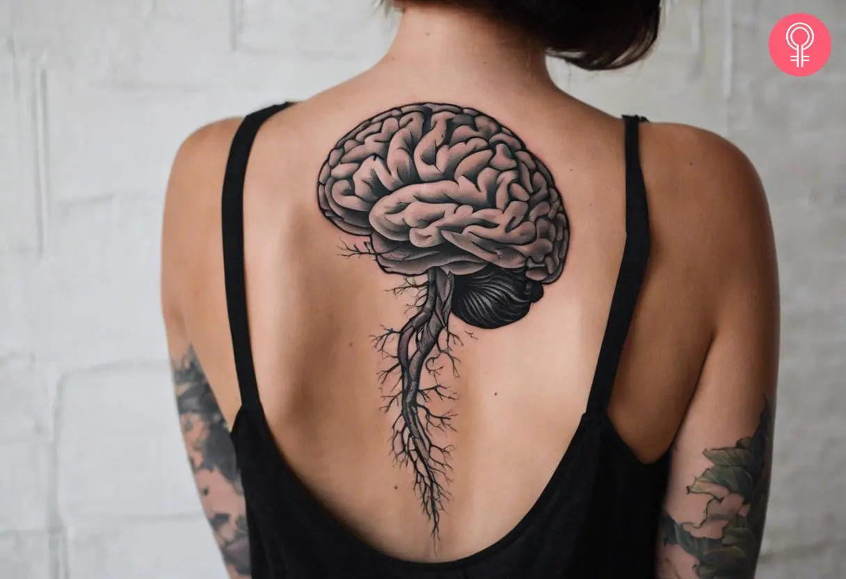 woman with traditional brain tattoo on her back