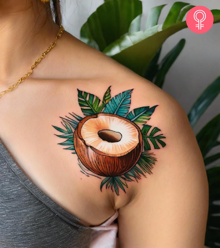 A woman flaunting a coconut tattoo on her shoulder