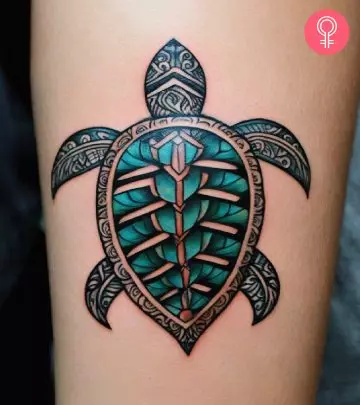 A cursive love tattoo on the upper arm.