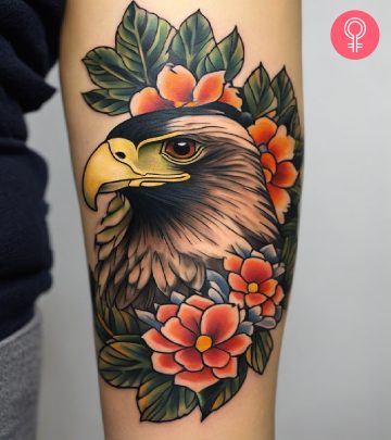 A marigold colored tattoo on the upper arm