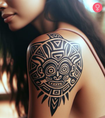 A woman with a Taino tattoo on her upper arm