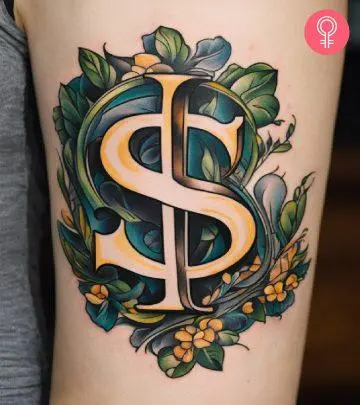 money bag tattoo on the upper arm