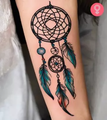 A dreamcatcher tattoo on the arm