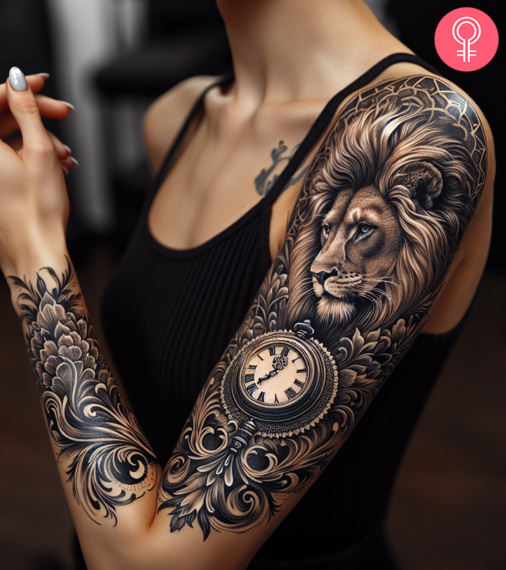 A blackwork lion clock tattoo with a floral design on the upper arm