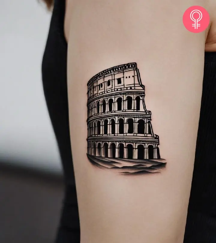 A Colosseum tattoo on a woman’s upper arm