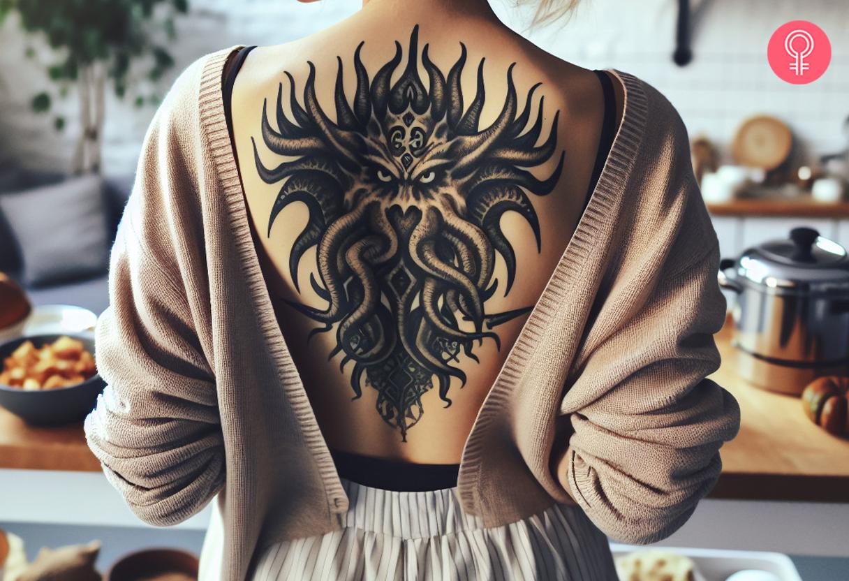 A Cthulhu tattoo on a woman's back